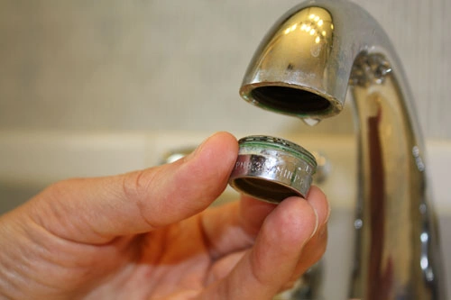how to clean clogged tap